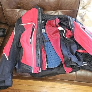 Motorcycle jacket with body armor and mesh liner.
